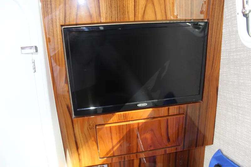  Yacht Photos Pics Interior of HCB 42 Lujo 2023 featuring built-in TV.