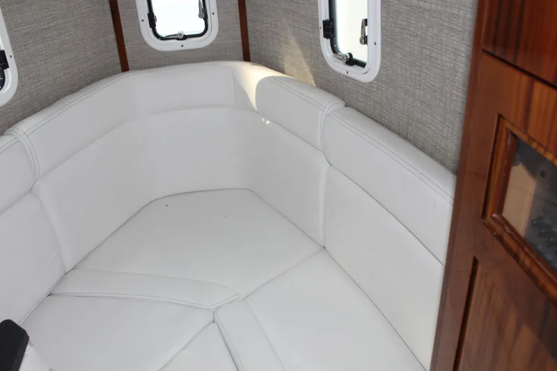  Yacht Photos Pics Interior of HCB 42 Lujo 2023 with white leather seating.