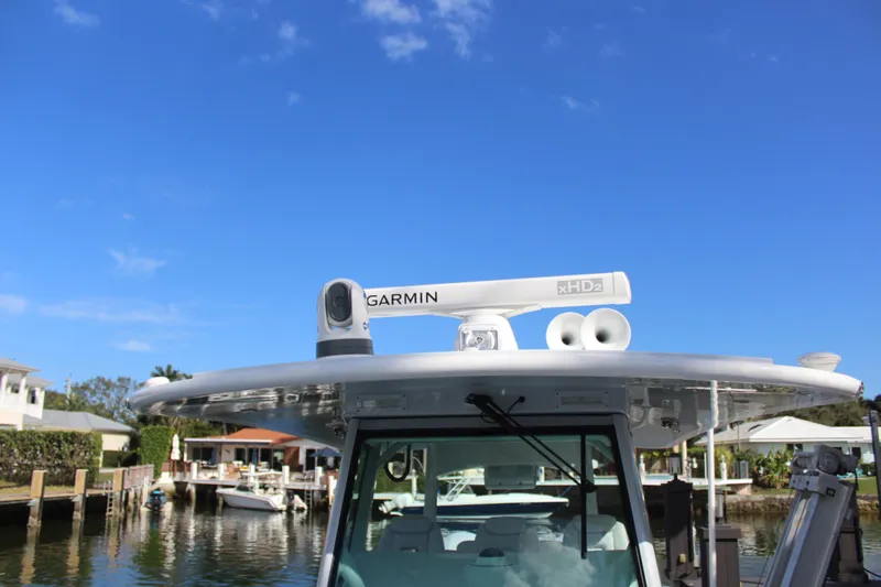  Yacht Photos Pics HCB 42 Lujo 2023 with Garmin equipment, blue sky background.