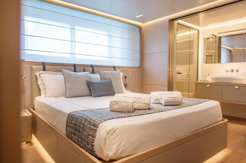 Tolemai Yacht Photos Pics Luxurious bedroom on 2023 Sanlorenzo XSP202 yacht with modern design and elegant decor.