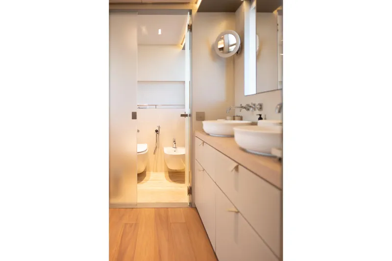 Tolemai Yacht Photos Pics Luxurious bathroom interior on 2023 Sanlorenzo XSP202 yacht, featuring modern fixtures and elegant design.