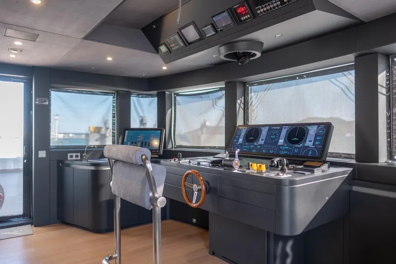 Tolemai Yacht Photos Pics Modern helm of 2023 Sanlorenzo XSP202 yacht with advanced navigation systems.