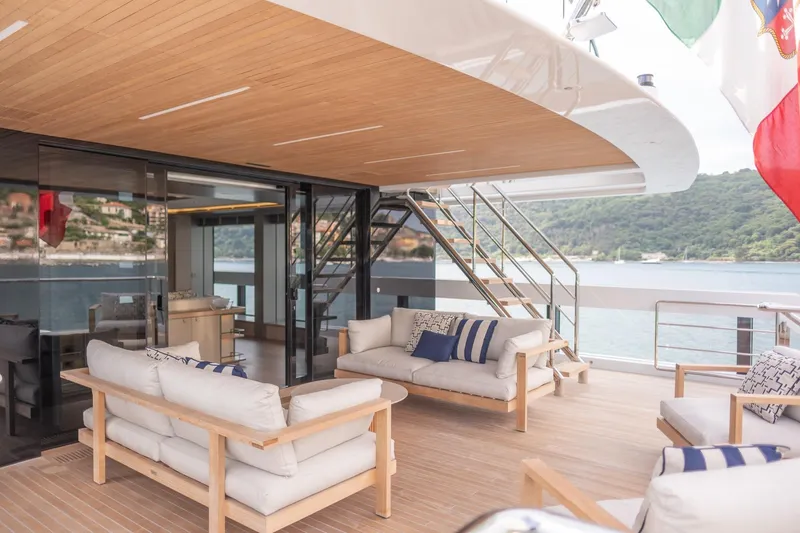 Tolemai Yacht Photos Pics Luxurious Sanlorenzo XSP202 yacht deck with elegant seating, scenic ocean view, and modern design.