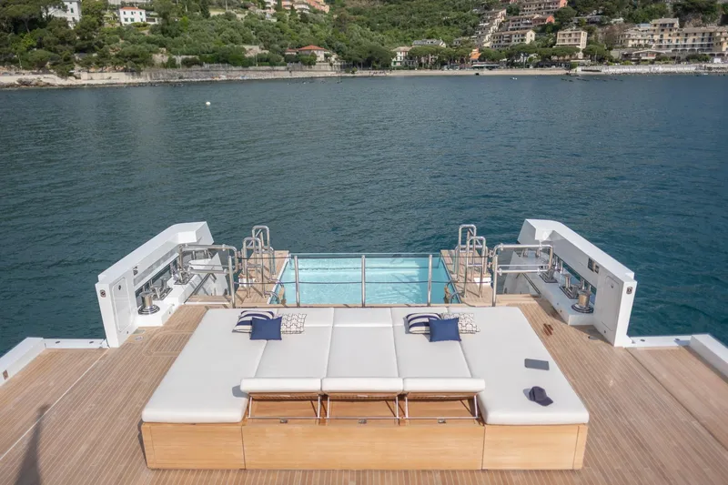 Tolemai Yacht Photos Pics Luxurious Sanlorenzo XSP202 yacht deck with sun loungers and sea view, 2023 model.