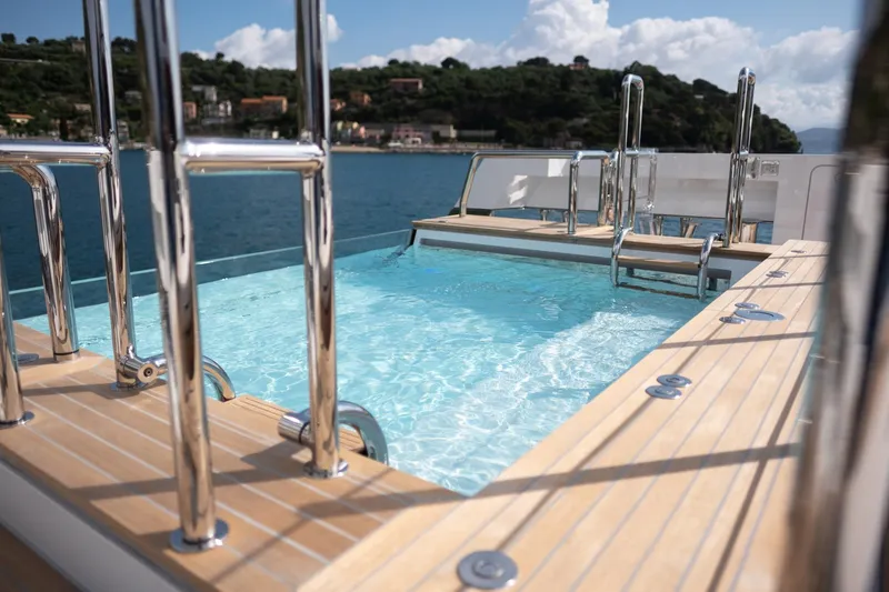 Tolemai Yacht Photos Pics Luxurious Sanlorenzo XSP202 yacht pool with stainless steel railings, 2023 model.