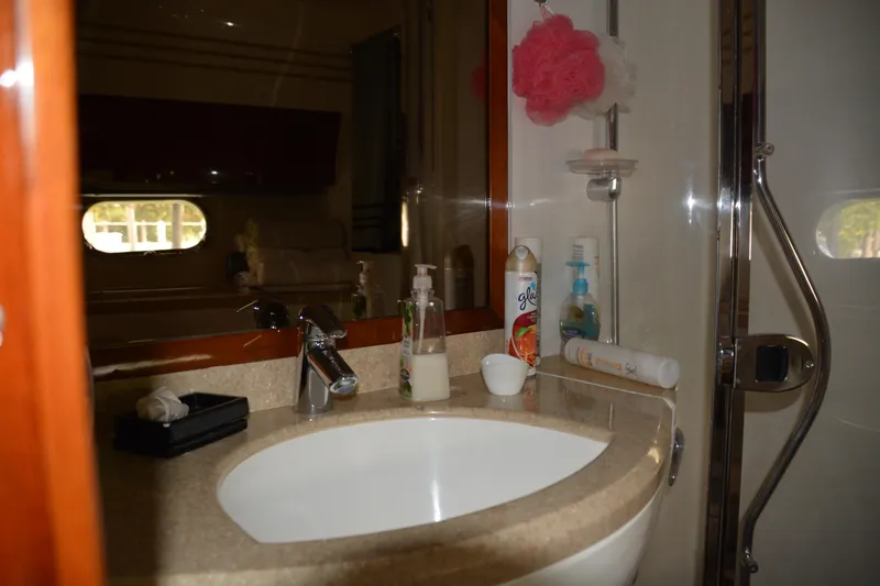 B&t Escape Yacht Photos Pics Luxurious bathroom in 2005 Princess 61 yacht with modern sink and toiletries.