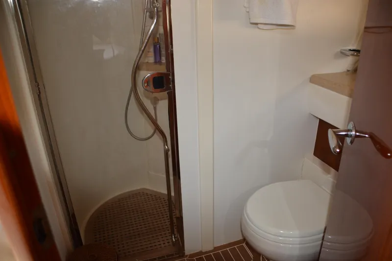 B&t Escape Yacht Photos Pics Bathroom with shower and toilet in 2005 Princess 61 yacht.