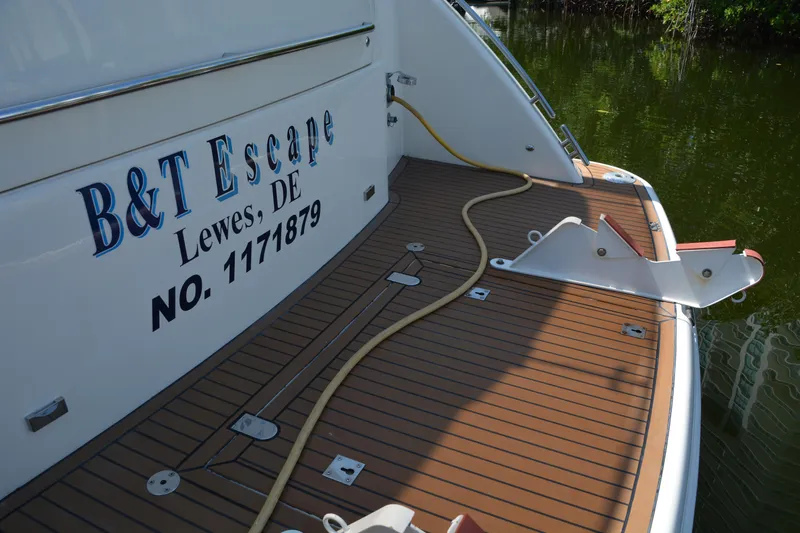 B&t Escape Yacht Photos Pics Stern view of 2005 Princess 61 yacht, "B&T Escape," docked in Lewes, DE.