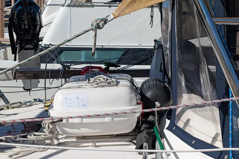'mystic Cay' Yacht Photos Pics Hunter 450 Passage 2002 sailboat deck with liferaft and ropes.