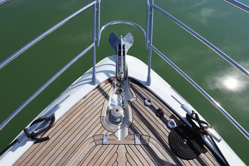  Yacht Photos Pics Bow of 2007 Azimut 62S yacht with anchor and teak deck.