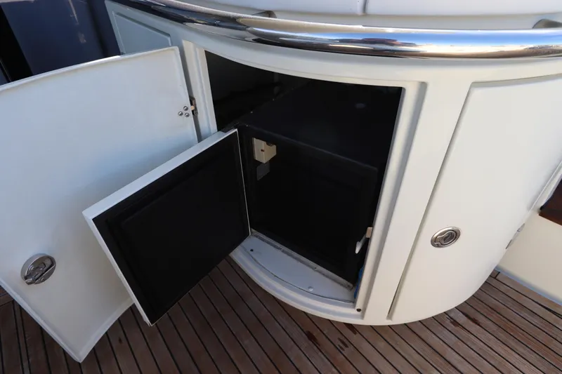  Yacht Photos Pics Open storage compartment on 2007 Azimut 62S yacht with wooden deck.