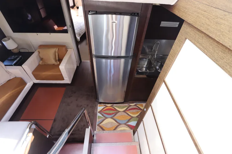  Yacht Photos Pics Interior of 2007 Azimut 62S yacht with kitchen and seating area.