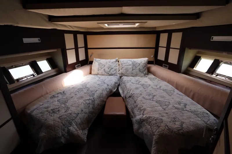  Yacht Photos Pics Luxurious 2007 Azimut 62S yacht cabin with twin beds and elegant decor.