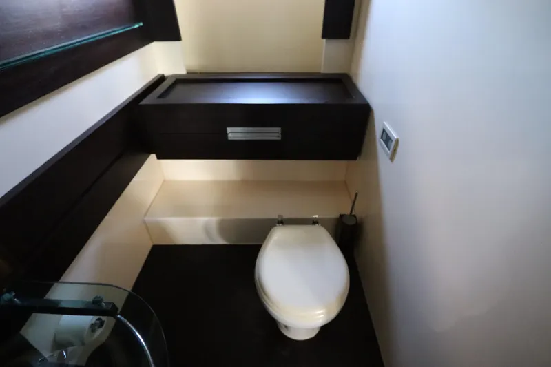  Yacht Photos Pics Luxury bathroom interior of 2007 Azimut 62S yacht, featuring modern fixtures and sleek design.