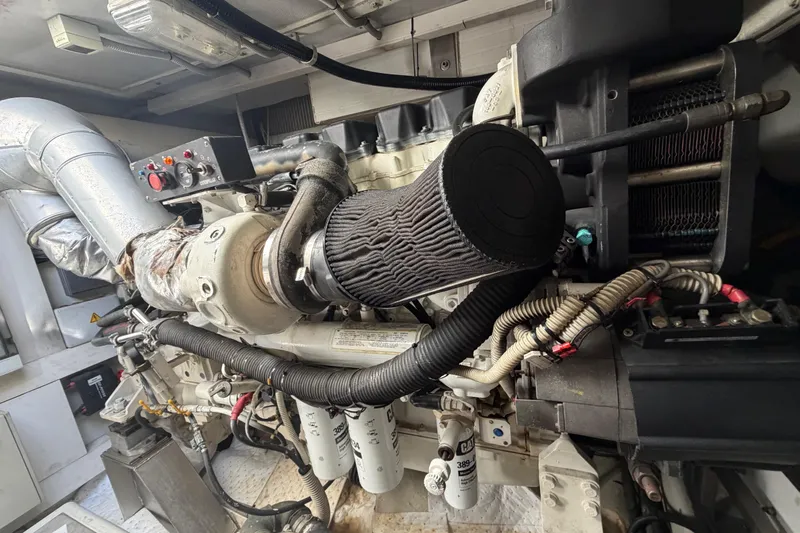  Yacht Photos Pics Engine room of a 2007 Azimut 62S yacht, showcasing detailed mechanical components.