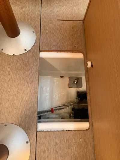  Yacht Photos Pics Interior view of 2016 Dufour 410 Grand Large yacht showing underfloor compartment.