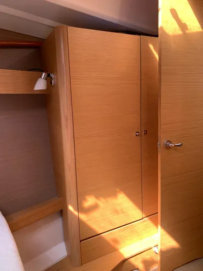 Yacht Photos Pics Interior of 2016 Dufour 410 Grand Large yacht with wooden cabinetry.