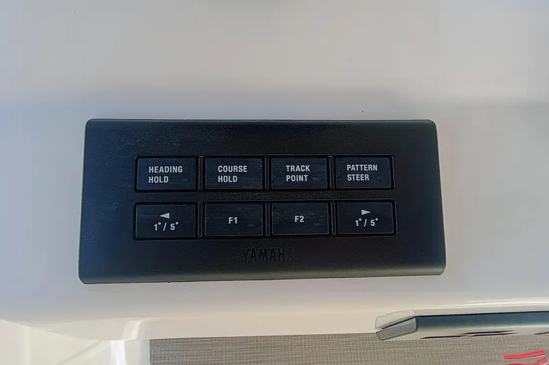 271-508 Brokerage Joe Yacht Photos Pics Control panel on 2023 Grady-White Canyon 271 boat with navigation buttons.