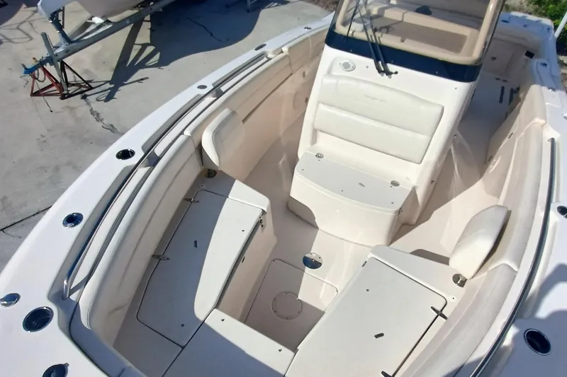 271-508 Brokerage Joe Yacht Photos Pics 2023 Grady-White Canyon 271 boat interior with seating and storage compartments.
