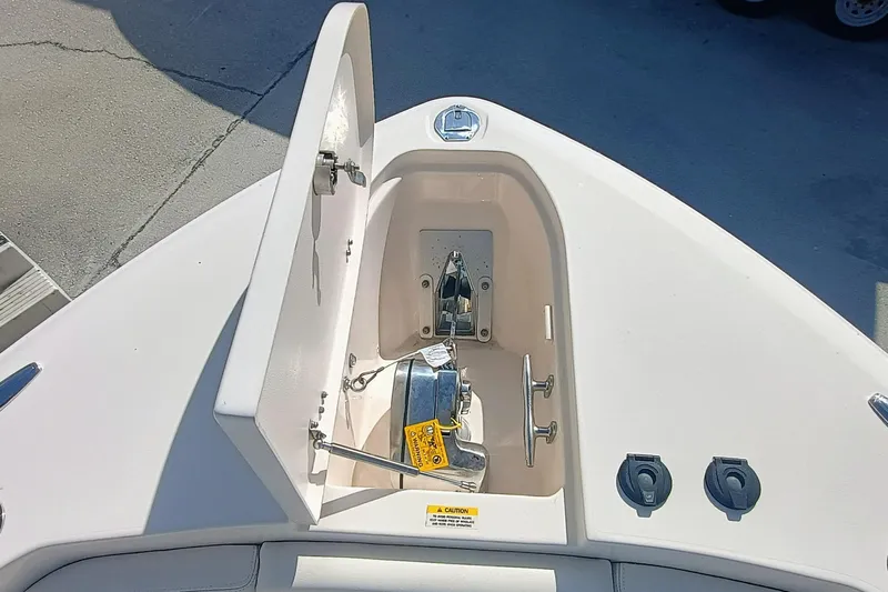 271-508 Brokerage Joe Yacht Photos Pics 2023 Grady-White Canyon 271 anchor locker with open hatch, showcasing storage and hardware.