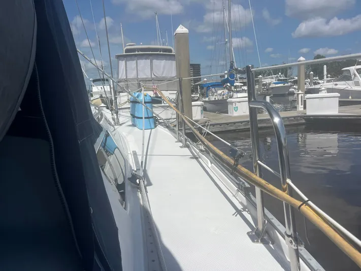 Bella Vita Yacht Photos Pics Sailboat docked at marina, Catalina 42 MkII, 1999 model, sunny day with blue skies.