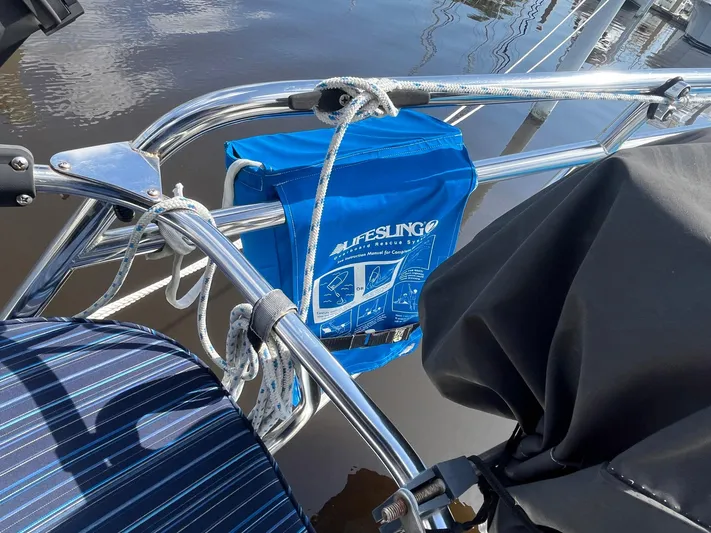 Bella Vita Yacht Photos Pics Blue lifesaving equipment on a 1999 Catalina 42 MkII sailboat railing.