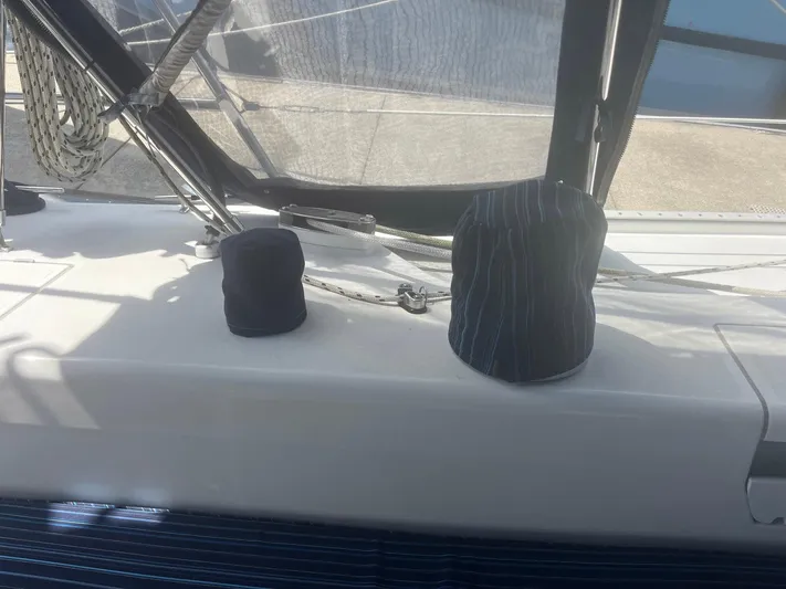 Bella Vita Yacht Photos Pics Sailboat deck of 1999 Catalina 42 MkII with covered winches and rigging.