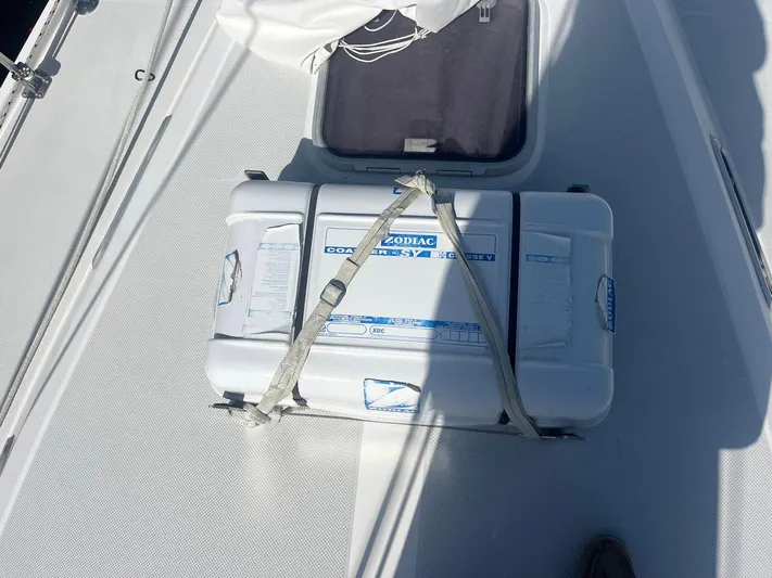 Bella Vita Yacht Photos Pics Life raft on deck of 1999 Catalina 42 MkII sailboat.