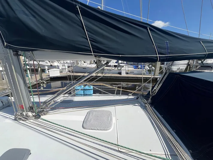 Bella Vita Yacht Photos Pics 1999 Catalina 42 MkII sailboat deck with rigging and marina background.