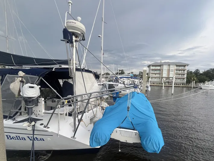 Bella Vita Yacht Photos Pics Sailboat Catalina 42 MkII, 1999, docked at marina with blue cover, overcast sky.