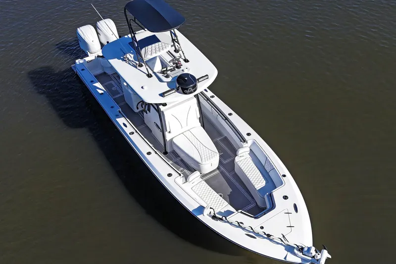 32st Fbmg Custom Edition Yacht Photos Pics 2024 Contender 32 ST boat with dual engines on calm water.