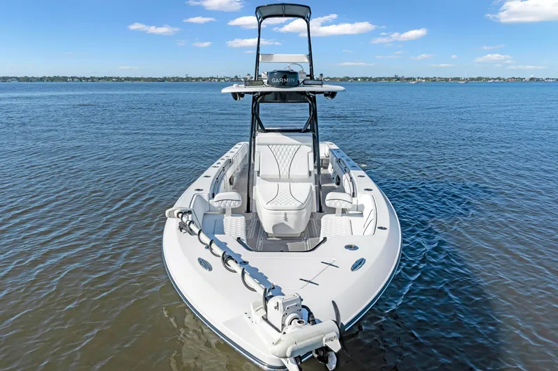 32st Fbmg Custom Edition Yacht Photos Pics 2024 Contender 32 ST boat on calm water, showcasing sleek design and advanced features.