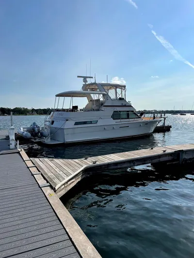  Yacht Photos Pics 1991 Hatteras 40 Motor Yacht docked on a sunny day.