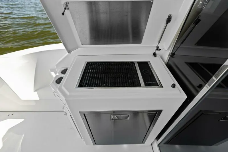 Perfect Match Yacht Photos Pics Outdoor grill on 2018 Cruisers Yachts 45 Cantius, featuring sleek design and stainless steel finish.