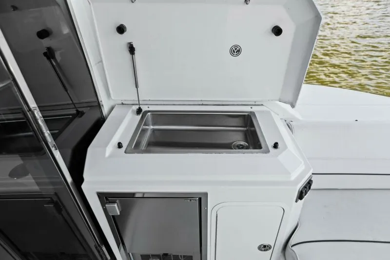 Perfect Match Yacht Photos Pics Outdoor sink and storage on 2018 Cruisers Yachts 45 Cantius boat.