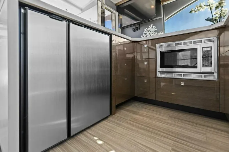 Perfect Match Yacht Photos Pics Modern kitchen in 2018 Cruisers Yachts 45 Cantius with stainless steel appliances.