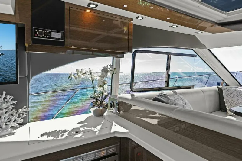 Perfect Match Yacht Photos Pics Luxurious interior of 2018 Cruisers Yachts 45 Cantius with ocean view.