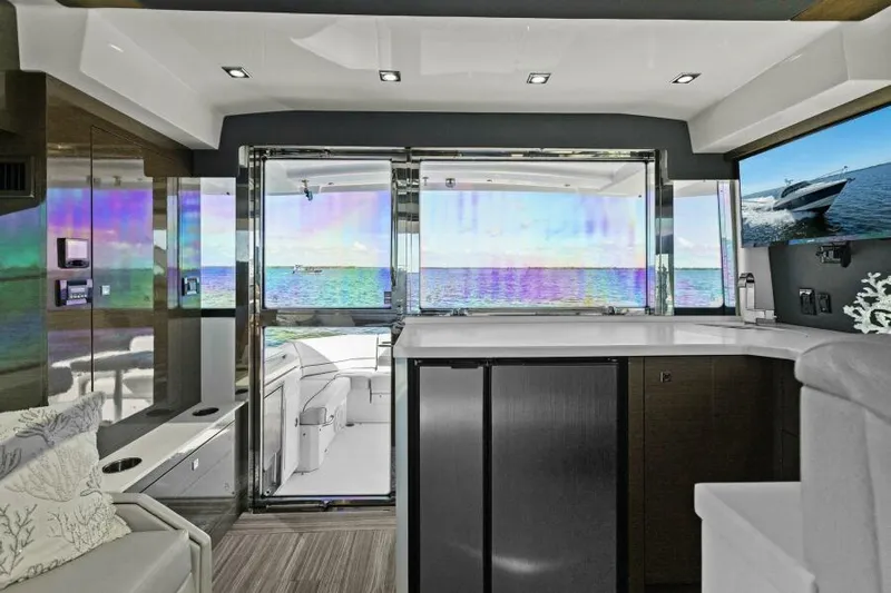 Perfect Match Yacht Photos Pics Luxurious interior of 2018 Cruisers Yachts 45 Cantius with ocean view.