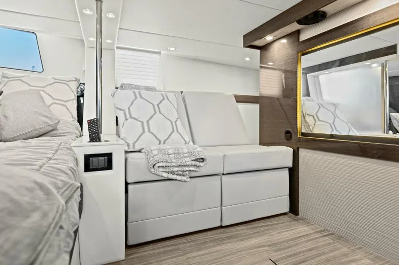 Perfect Match Yacht Photos Pics Luxurious interior of 2018 Cruisers Yachts 45 Cantius with modern seating and decor.
