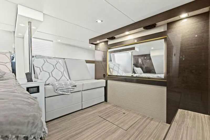 Perfect Match Yacht Photos Pics Luxurious interior of 2018 Cruisers Yachts 45 Cantius with modern seating and elegant decor.