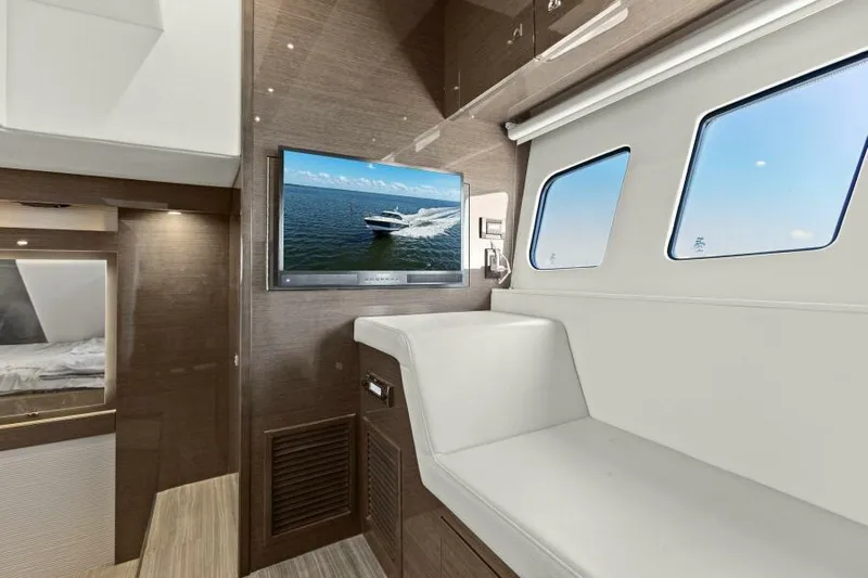 Perfect Match Yacht Photos Pics Interior of 2018 Cruisers Yachts 45 Cantius with modern seating and TV.