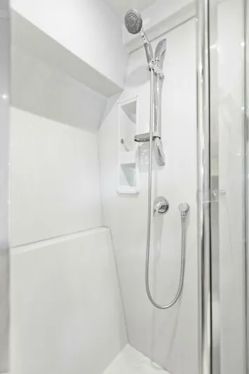 Perfect Match Yacht Photos Pics Luxurious shower in 2018 Cruisers Yachts 45 Cantius, featuring modern fixtures and sleek design.