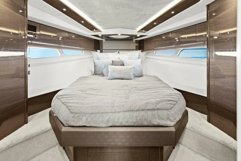 Perfect Match Yacht Photos Pics Luxurious 2018 Cruisers Yachts 45 Cantius cabin interior with elegant bedding and modern design.