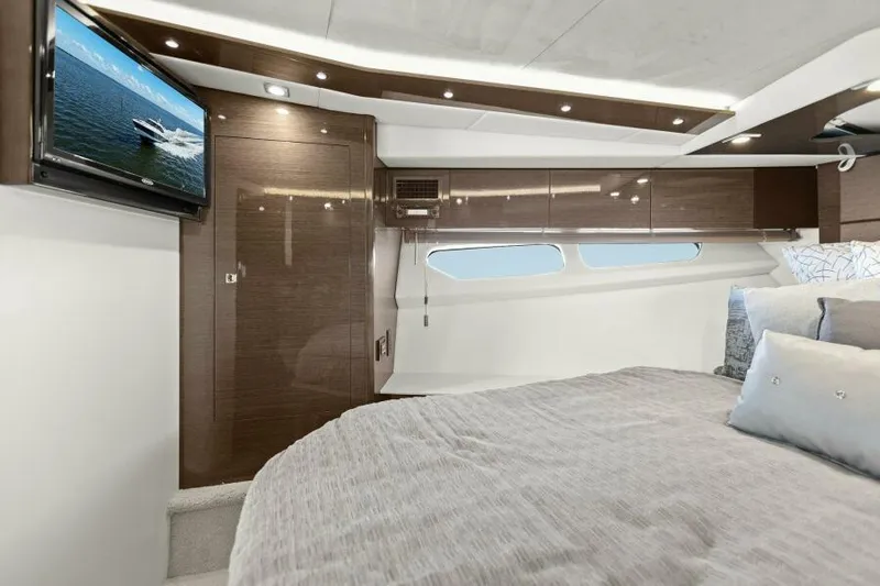 Perfect Match Yacht Photos Pics Luxurious 2018 Cruisers Yachts 45 Cantius cabin interior with modern design and cozy bedding.