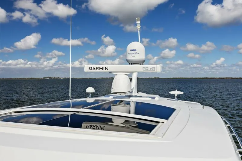 Perfect Match Yacht Photos Pics 2018 Cruisers Yachts 45 Cantius with Garmin radar on open water under blue sky.