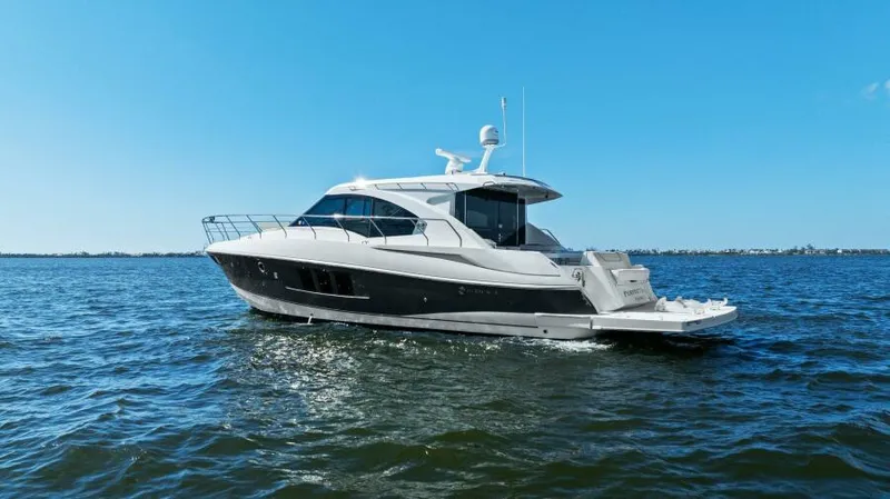 Perfect Match Yacht Photos Pics 2018 Cruisers Yachts 45 Cantius on open water, sleek design, sunny day.