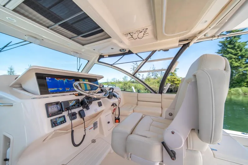  Yacht Photos Pics 2019 Grady-White Express boat cockpit with advanced navigation systems and luxurious seating.