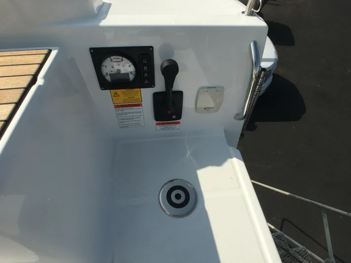  Yacht Photos Pics Control panel of 2024 Beneteau Oceanis 30.1 sailboat, featuring throttle and gauge.