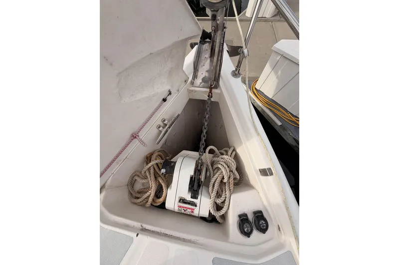 Serendipity II Yacht Photos Pics Anchor locker of a 2002 Hunter 460 sailboat with ropes and chain.
