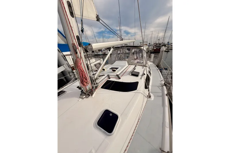 Serendipity II Yacht Photos Pics 2002 Hunter 460 sailboat docked at marina, showcasing deck and rigging.